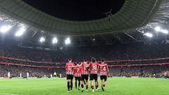 Athletic Bilbao's players celebrate scoring their third goal during the Spanish league football match between Athletic Club Bilbao and Girona FC at the San Mames stadium in Bilbao on February 19, 2024. (Photo by Ander Gillenea / AFP)