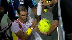 MASON, OHIO - AUGUST 17: Rafael Nadal of Spain signs autographs for fans after losing his match to Borna Coric of Croatia 7-6, 4-6, 6-3 during the Western & Southern Open at the Lindner Family Tennis Center on August 17, 2022 in Mason, Ohio.   Dylan Buell/Getty Images/AFP
== FOR NEWSPAPERS, INTERNET, TELCOS & TELEVISION USE ONLY ==