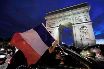 French fans take to the streets to celebrate World Cup final place