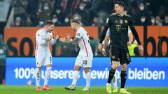 AUGSBURG, GERMANY - NOVEMBER 19: Mads Pedersen of FC Augsburg celebrates with Niklas Dorsch after scoring their team&#039;s first goal during the Bundesliga match between FC Augsburg and FC Bayern M&uuml;nchen at WWK-Arena on November 19, 2021 in Augsburg