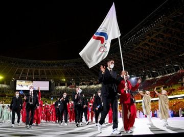 Flag bearers Sofya Velikaya and Maxim Mikhaylov of Team ROC lead their team during the Opening Ceremony of the Tokyo 2020.
