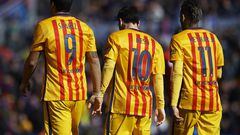  Luis Suarez, Lionel Messi and Neymar JR of Barcelona walk on the pitch during the La Liga match between Levante UD and FC Barcelona at Ciutat de Valencia 