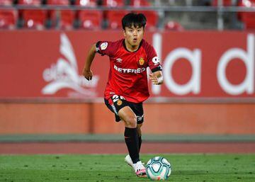 MALLORCA, SPAIN - JUNE 13: Takefusa 'Take' Kubo of RCD Mallorca runs with the ball during the Liga match between RCD Mallorca and FC Barcelona at Estadio de Son Moix on June 13, 2020 in Mallorca, Spain. (Photo by David Ramos/Getty Images)