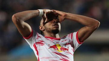 BERGAMO, ITALY - APRIL 14: Christopher Nkunku of RB Leipzig reacts during the UEFA Europa League Quarter Final Leg Two match between Atalanta and RB Leipzig at Stadio di Bergamo on April 14, 2022 in Bergamo, Italy. (Photo by Emilio Andreoli/Getty Images)