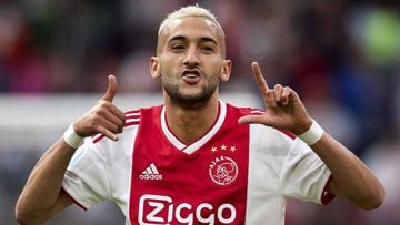 Ajax&#039; Moroccan midfielder Hakim Ziyech celebrates after scoring a goal during the Dutch Eredivisie football match between Ajax and FC Emmen, in Amsterdam, on 25 August 2018. (Photo by Olaf KRAAK / ANP / AFP) / Netherlands OUT