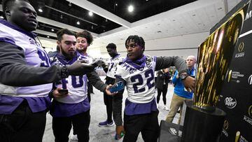 Los Angeles, CA - January 07:  TCU Horned Frogs players take pictures National Championship trophy for during media day for the College Football Playoff championship game at the Los Angeles Convention Center in Los Angeles on Saturday, January 7, 2023. (Photo by Keith Birmingham/MediaNews Group/Pasadena Star-News via Getty Images)