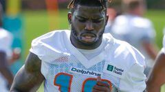 MIAMI GARDENS, FL - JUNE 1: Tyreek Hill #10 of the Miami Dolphins warms up during the Miami Dolphins OTAs at the Baptist Health Training Complex on June 1, 2022 in Miami Gardens, Florida. (Photo by Joel Auerbach/Getty Images)