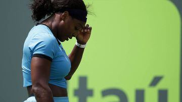 Serena Williams reacts after missing a shot against Svetlana Kuznetsova.