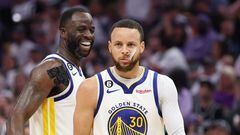 SACRAMENTO, CALIFORNIA - APRIL 30: Stephen Curry #30 of the Golden State Warriors and Draymond Green #23 react during the fourth quarter in game seven of the Western Conference First Round Playoffs against the Sacramento Kings at Golden 1 Center on April 30, 2023 in Sacramento, California. NOTE TO USER: User expressly acknowledges and agrees that, by downloading and or using this photograph, User is consenting to the terms and conditions of the Getty Images License Agreement.   Ezra Shaw/Getty Images/AFP (Photo by EZRA SHAW / GETTY IMAGES NORTH AMERICA / Getty Images via AFP)