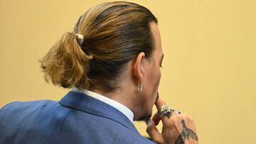 US actor Johnny Depp arrives at the Fairfax County Circuit Courthouse in Fairfax, Virginia, on May 24, 2022. - Actor Johnny Depp is suing ex-wife Amber Heard for libel after she wrote an op-ed piece in The Washington Post in 2018 referring to herself as a public figure representing domestic abuse. (Photo by JIM WATSON / POOL / AFP) (Photo by JIM WATSON/POOL/AFP via Getty Images)
