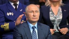 Russian President Vladimir Putin attends a forum held by the All-Russian Popular Front group in Moscow