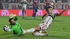 Sao Paulo's forward Luciano strikes and scores a goal past San Lorenzo's goalkeeper Augusto Batalla during the Copa Sudamericana round of 16 second leg football match between Brazil's Sao Paulo and Argentina's San Lorenzo, at the Morumbi stadium in Sao Paulo, Brazil, on August 10, 2023. (Photo by NELSON ALMEIDA / AFP)