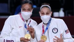 First placed team USA&#039;s players pose for pictures with their gold medals on the podium during the medal ceremony for the women&#039;s basketball competition of the Tokyo 2020 Olympic Game.