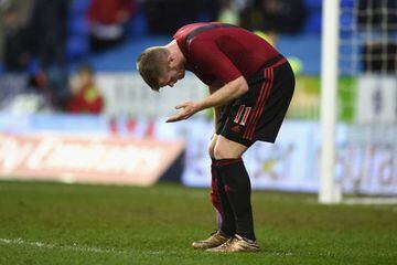 Chris Brunt of West Bromwich Albion reacts after being hit by an object during the Emirates FA Cup fifth round match between Reading and West Bromwich Albion at the Madejski Stadium on February 20, 2016 in Reading, England.