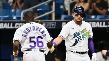 ST PETERSBURG, FLORIDA - SEPTEMBER 22: Randy Arozarena #56 of the Tampa Bay Rays is congratulated by Isaac Paredes #17 after scoring in the first inning against the Toronto Blue Jays at Tropicana Field on September 22, 2023 in St Petersburg, Florida.   Julio Aguilar/Getty Images/AFP (Photo by Julio Aguilar / GETTY IMAGES NORTH AMERICA / Getty Images via AFP)