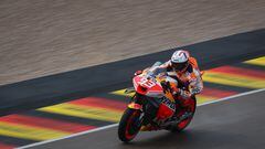 Honda Spanish rider Marc Marquez steers his motorbike during the qualifying session for the MotoGP German motorcycle Grand Prix at the Sachsenring racing circuit in Hohenstein-Ernstthal near Chemnitz, eastern Germany, on June 17, 2023. (Photo by Ronny Hartmann / AFP)