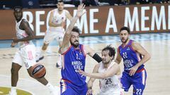 MADRID, SPAIN - APRIL 27: Sertac Sanli (L) of Anadolu Efes in action against Sergio Llull (23) of Real Madrid during Turkish Airlines EuroLeague quarterfinal play-offs between Real Madrid and Anadolu Efes at Wizink Center in Madrid, Spain on April 27, 202