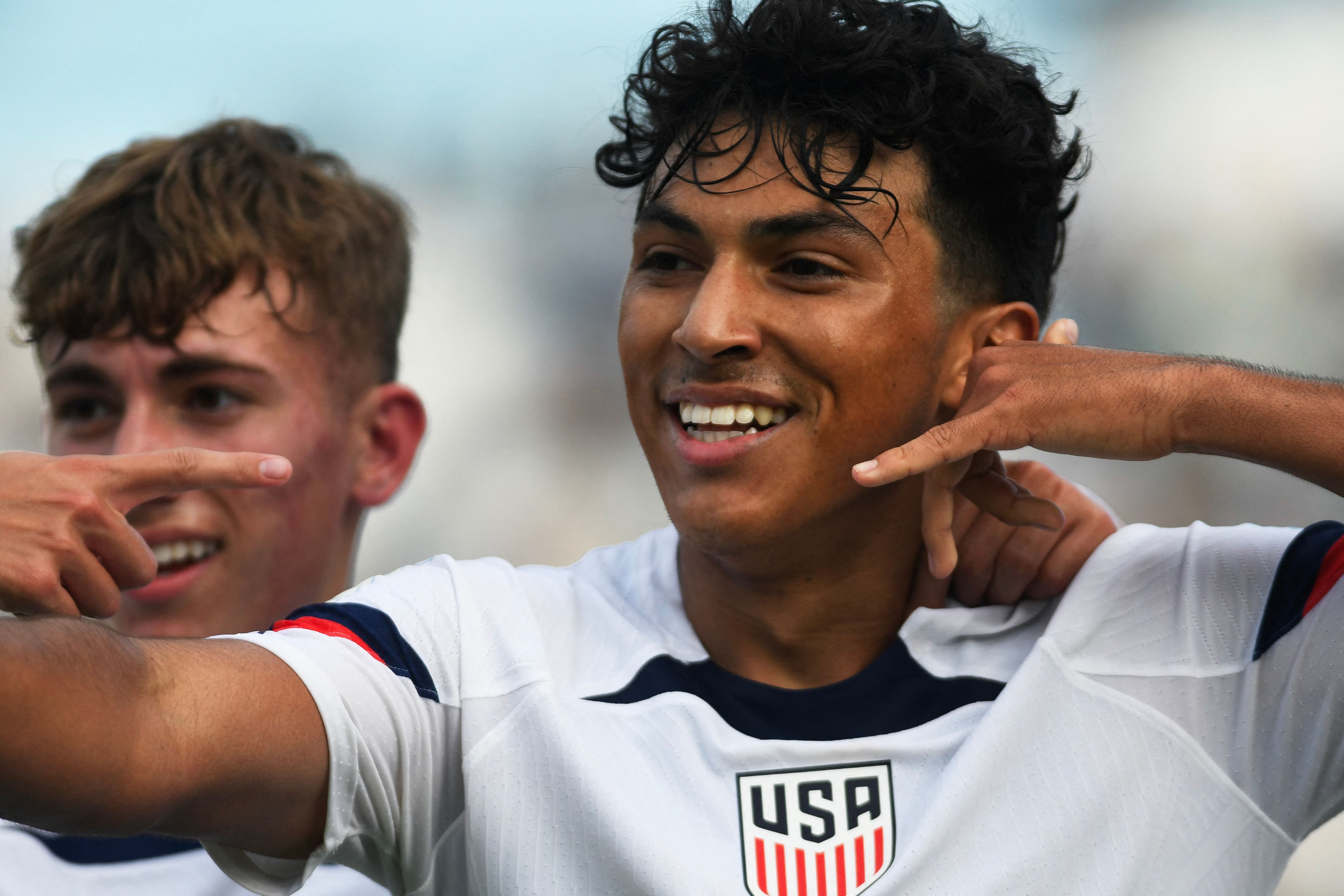 USA's midfielder Jonathan German Gomez (R) celebrates after scoring a goal during the Argentina 2023 U-20 World Cup Group B football match between USA and  Ecuador at the San Juan del Bicentenario stadium in San Juan, Argentina on May 20, 2023. (Photo by Andres Larrovere / AFP)