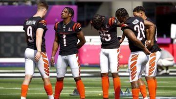 LOS ANGELES, CALIFORNIA - FEBRUARY 12: L-R Joe Burrow #9, Ja&#039;Marr Chase #1, Tee Higgins #85 and Joe Mixon #28 of the Cincinnati Bengals wait for the team photo to be taken at SoFi Stadium on February 12, 2022 in Los Angeles, California. The Bengals w