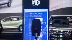 BANGKOK, THAILAND - 2022/08/19: A MG Home charging component is displayed next to a vehicle during the event. The Thailand Big Motor Sale 2022 runs from the 19 to 28 August 2022 at BITEC Bangna in Bangkok. The event showcases 17 car and 4 motorcycle brands as well as electric vehicles in the hope of boosting sales in Third Quarter of the year. (Photo by Peerapon Boonyakiat/SOPA Images/LightRocket via Getty Images)