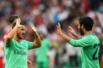 Real Madrid's Eden Hazard (L) celebrates with his teammate Isco (R) after scoring the 1-0 lead during the friendly soccer match between FC Red Bull Salzburg and Real Madrid in Salzburg, Austria, 07 August 2019.