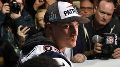 (FILES) In this file photo taken on February 1, 2018 New England Patriots tight end Rob Gronkowski talks to the press during a media availability at the Super Bowl LII Media Center at the  Mall of America in Bloomington, Minnesota. As if losing the Super