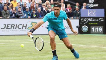 STUTTGART, GERMANY - JUNE 13:  Roger Federer of Switzerland plays a backhand to Mischa Zverev of Germany during day 3 of the Mercedes Cup at Tennisclub Weissenhof on June 13, 2018 in Stuttgart, Germany. Roger Federer debuts his new Wilson Pro Staff RF 97 
