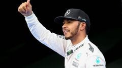 Hamilton blazes to pole and sets new lap record at Sepang