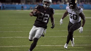 Aug 4, 2022; Canton, Ohio, USA; Las Vegas Raiders running back Ameer Abdullah (22) runs for a touchdown against Jacksonville Jaguars linebacker Shaquille Quarterman (50) in the second quarter in the Hall of Fame game at Tom Benson Hall of Fame Stadium. Mandatory Credit: Ken Blaze-USA TODAY Sports