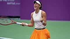 Caroline Garcia celebrates winning the Tianjin Open tennis tournament. 