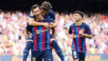 BARCELONA, SPAIN - SEPTEMBER 17: Robert Lewandowski of FC Barcelona celebrates with his teammates Pablo Paez Gavira 'Gavi' of FC Barcelona after scoring his team's third goal during the LaLiga Santander match between FC Barcelona and Elche CF at Spotify Camp Nou on September 17, 2022 in Barcelona, Spain. (Photo by Alex Caparros/Getty Images)