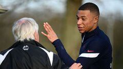France&#039;s forward Kylian Mbappe (R) reacts ahead of a training session in Clairefontaine-en-Yvelines, near Paris on March 21, 2022 ahead of the friendly matches against Ivory Coast and South Africa. (Photo by FRANCK FIFE / AFP)