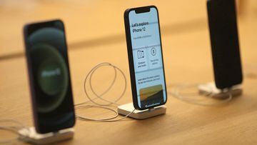 FILE PHOTO: IPhone 12 phones are seen at the new Apple Store on Broadway in downtown Los Angeles, California, U.S., June 24, 2021. REUTERS/Lucy Nicholson/File Photo