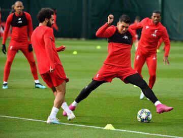 Liverpool's Mohamed Salah and Roberto Firmino in today's session at Melwood