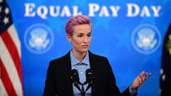 (FILES) In this file photo taken on March 24, 2021 US soccer player Megan Rapinoe speaks during an Equal Pay Day event in the South Court Auditorium of the White House in Washington, DC. - The United States Soccer Federation said September 14, 2021 it has