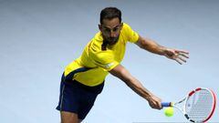 MADRID, SPAIN - NOVEMBER 18:  Santiago Giraldo of Colombia returns a backhand against Steve Darcis of Belgium during Day 1 of the 2019 Davis Cup at La Caja Magica on November 18, 2019 in Madrid, Spain. (Photo by Clive Brunskill/Getty Images)