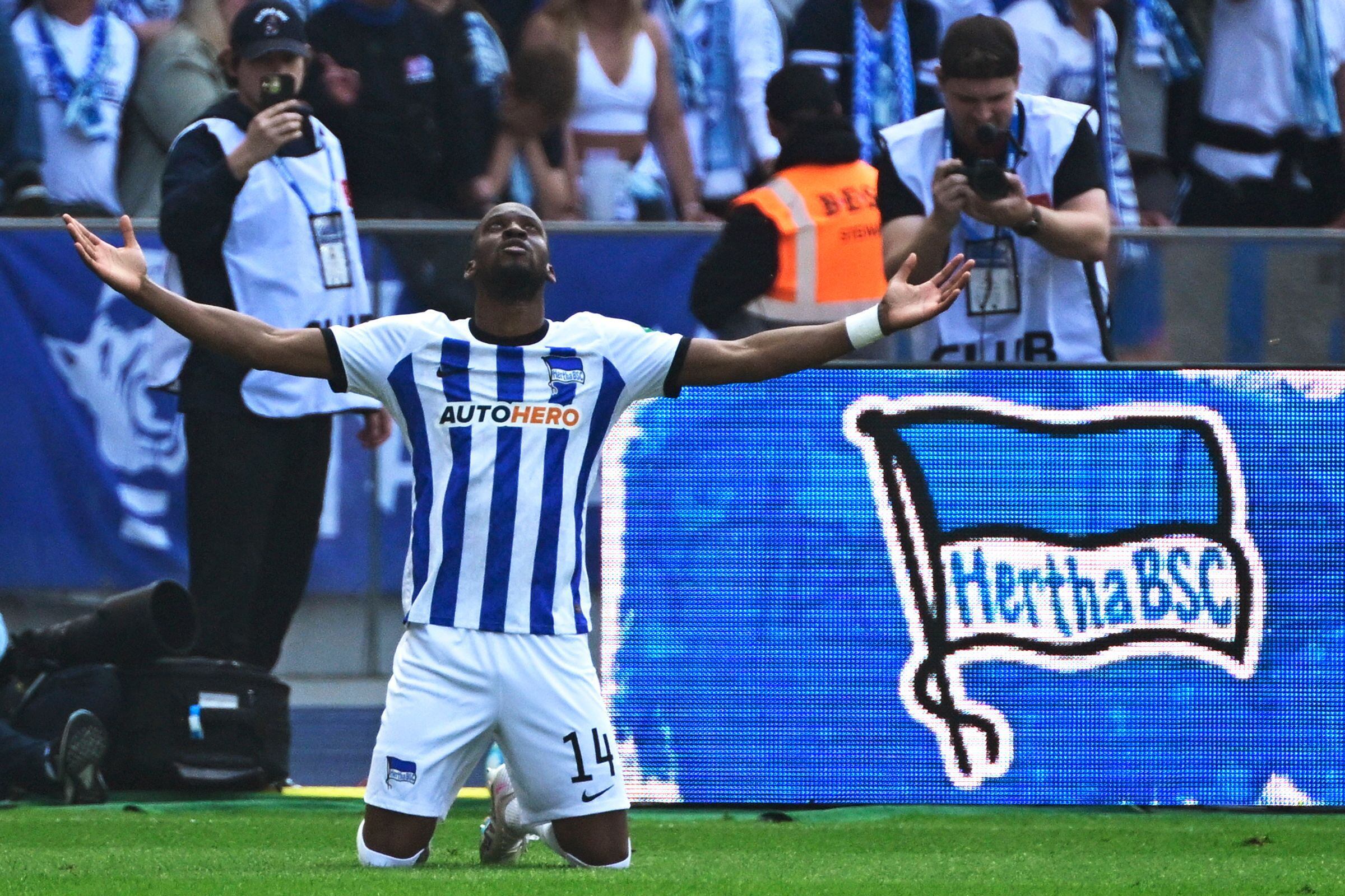 Hertha Berlin�s Belgian forward Dodi Lukebakio celebrates scoring a later unvalidated goal during the German first division Bundesliga football match between Hertha Berlin and VfL Bochum in Berlin, Germany, on May 20, 2023. (Photo by John MACDOUGALL / AFP) / DFL REGULATIONS PROHIBIT ANY USE OF PHOTOGRAPHS AS IMAGE SEQUENCES AND/OR QUASI-VIDEO
