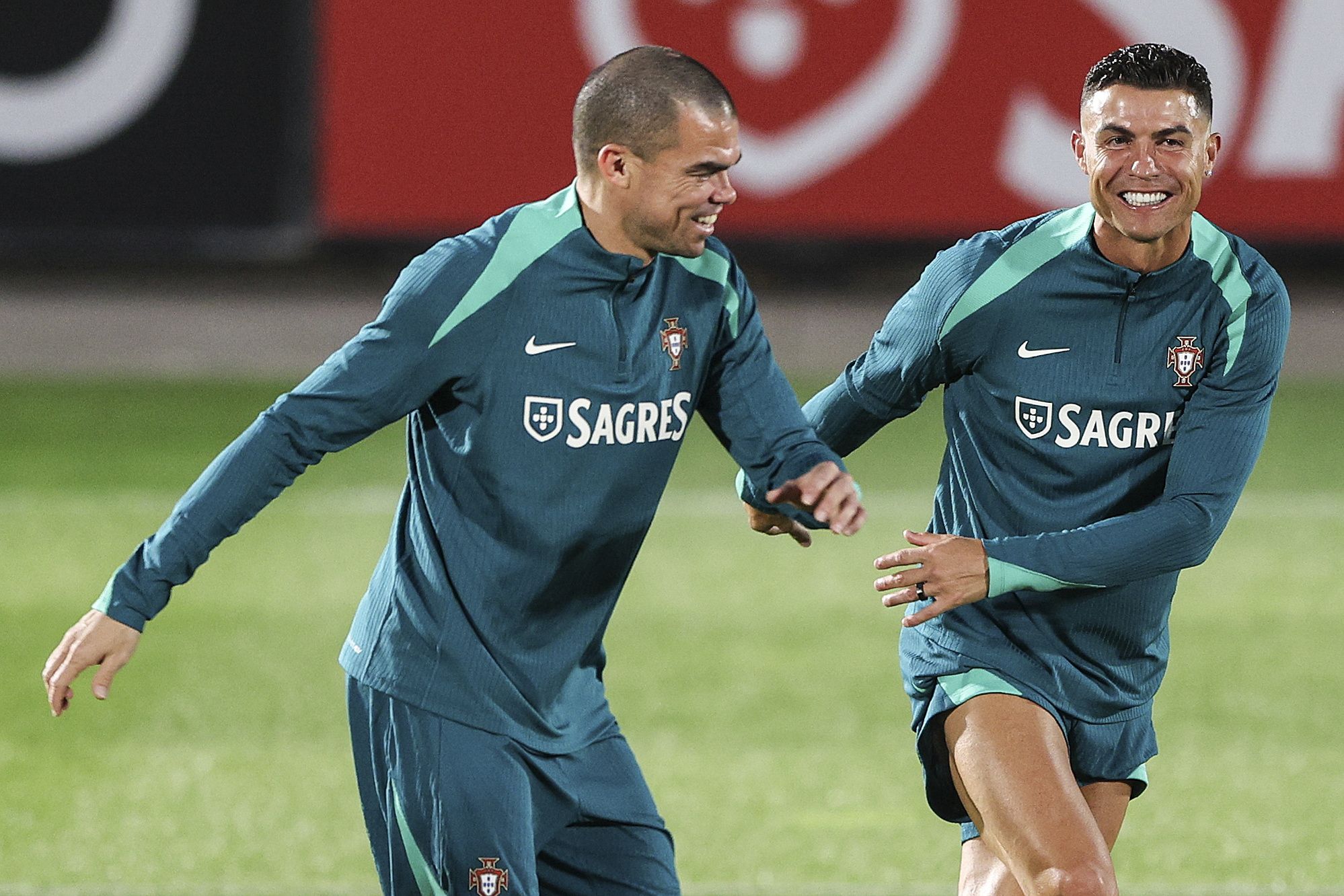 Cristiano Ronaldo (R) and Pepe of Portugal 