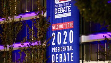 29 September 2020, US, Cleveland: A poster for the first presidential debate of 2020 between US&nbsp;President Donald Trump and Democratic contender Joe Biden, is hanged on a building at Case Western Reserve University. Photo: Amy Katz/ZUMA Wire/dpa   