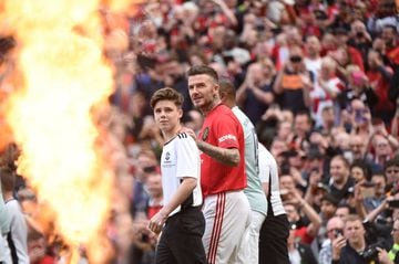 MANCHESTER, ENGLAND - MAY 26: David Beckham of Manchester United looks on during the Manchester United '99 Legends v FC Bayern Legends at Old Trafford on May 26, 2019 in Manchester, England. (Photo by Nathan Stirk/Getty Images)
