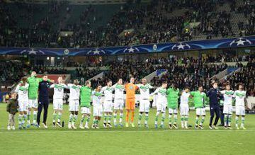 VfL Wolfsburg players celebrate their team's 2-0 win in the UEFA Champions League Quarter Final First Leg match between VfL Wolfsburg and Real Madrid at Volkswagen Arena on April 6, 2016 in Wolfsburg, Germany.