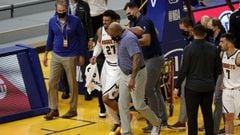 Jamal Murray was helped off the court, after going down with a knee injury in final minute of the Nuggets loss to the Golden State Warriors last night