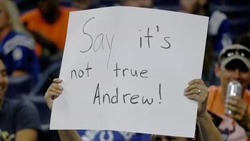 INDIANAPOLIS, IN - AUGUST 24: An Indianapolis Colts fan holds up a sign after Adam Schefter tweeted that Andrew Luck was planning on retiring during the fourth quarter of the game between the Chicago Bears and the Indianapolis Colts at Lucas Oil Stadium o