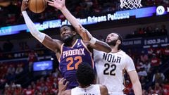 NEW ORLEANS, LOUISIANA - APRIL 24: Deandre Ayton #22 of the Phoenix Suns rebounds the ball against Larry Nance Jr. #22 of the New Orleans Pelicans during the first half of Game Four of the Western Conference First Round at the Smoothie King Center on April 24, 2022 in New Orleans, Louisiana.