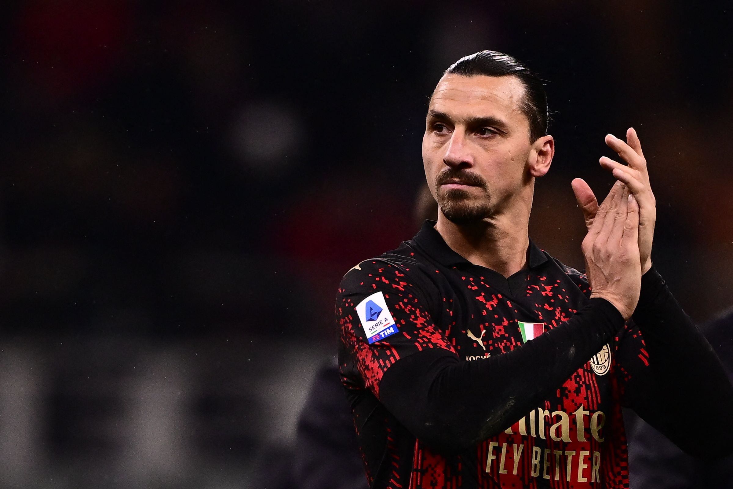(FILES) AC Milan's Swedish forward Zlatan Ibrahimovic acknowledges the public at the end of the Italian Serie A football match between AC Milan and Atalanta at the San Siro stadium in Milan on February 26, 2023. - Zlatan Ibrahimovic's injury-hit season could be at an end after AC Milan said on April 29, 2023 that the Sweden international has picked up a knock to his right calf adding that there was a "small hope" that he could play before the end of the season, which finishes on the first weekend in June.. (Photo by Marco BERTORELLO / AFP)