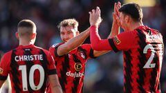BOURNEMOUTH, ENGLAND - OCTOBER 08: Jack Stacey of AFC Bournemouth celebrates victory with Ryan Christie and Kieffer Moore following the Premier League match between AFC Bournemouth and Leicester City at Vitality Stadium on October 08, 2022 in Bournemouth, England. (Photo by Warren Little/Getty Images)