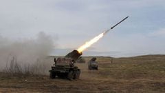 A Ukrainian BM-21 multiple rocket launcher shells Russian troops near Luhansk, in the Donbas region, on April 10, 2022.