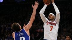 Feb 25, 2017; New York, NY, USA;  New York Knicks forward Carmelo Anthony (7) makes the game winning shot against Philadelphia 76ers forward Dario Saric (9) during second half at Madison Square Garden. The New York Knicks defeated the Philadelphia 76ers 1