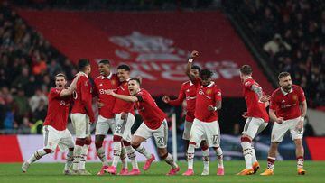 Manchester United players celebrate after they won a penalty shoot out during the English FA Cup semi-final football match between Manchester United and Brighton and Hove Albion at Wembley Stadium in north west London on April 23, 2023. (Photo by Adrian DENNIS / AFP) / NOT FOR MARKETING OR ADVERTISING USE / RESTRICTED TO EDITORIAL USE