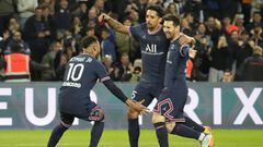 PSG&#039;s Neymar, left, and Marquinhos, center, celebrate as Lionel Messi, right, scored the opening goal during the French League One soccer match between Paris Saint Germain and Lens at Parc des Princes stadium in Paris, Saturday, April 23, 2022. (AP P